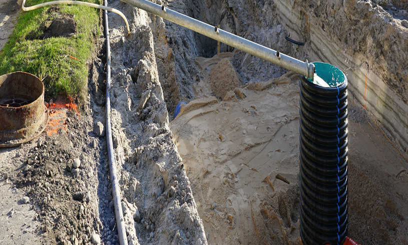 Underground drainage system installation in progress