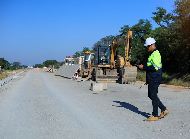Engineer inspecting construction progress
