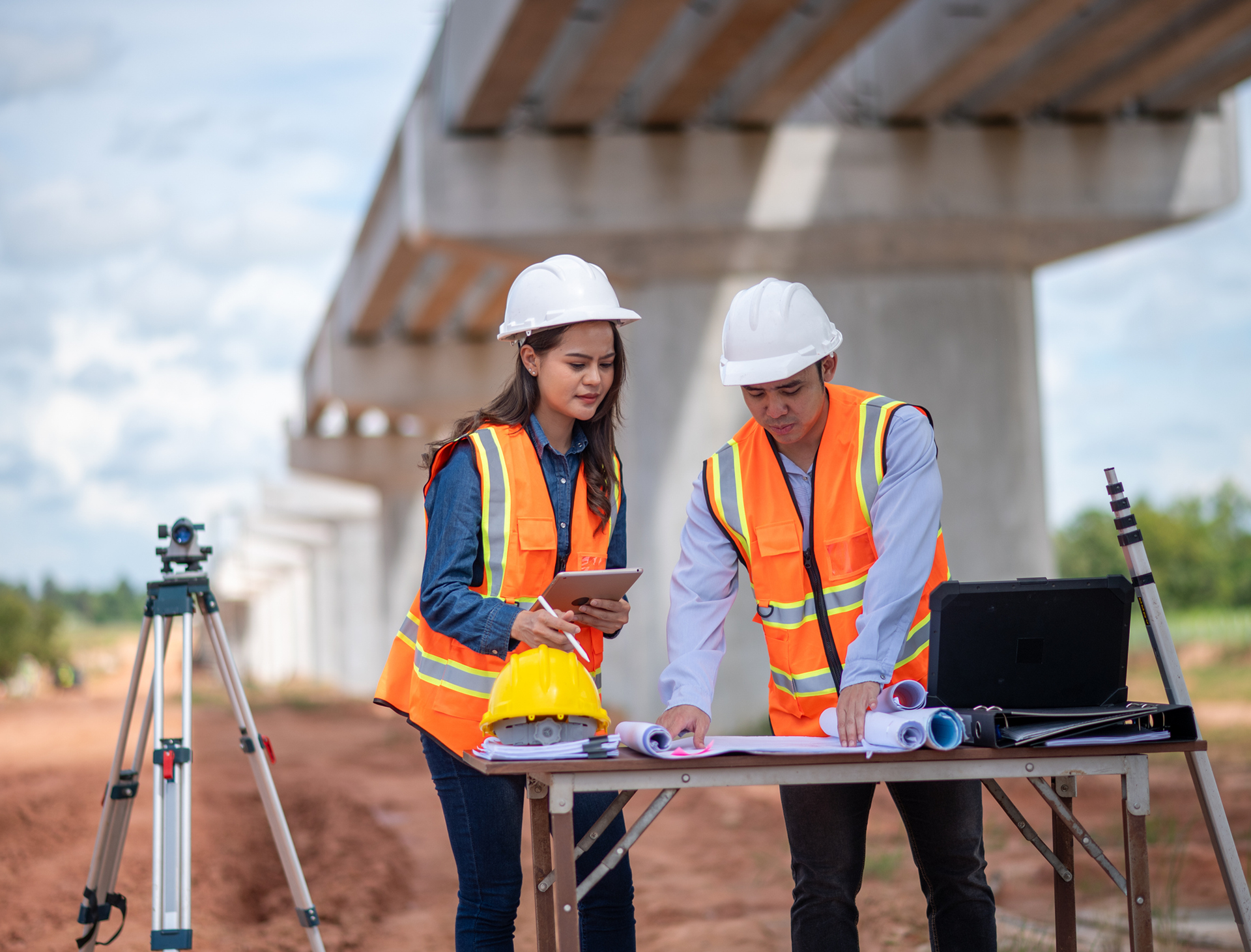 Two engineers planning infrastructure project